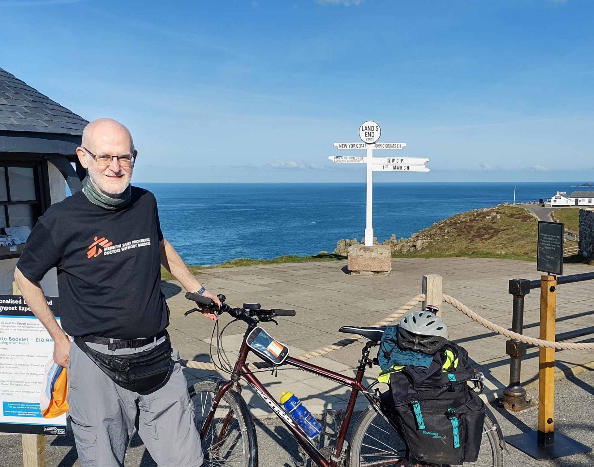Phil Morcom with his bicycle at Land's End in Cornwall at the start of his 1,000-mile ride to John O'Groats on March 1, 2025.