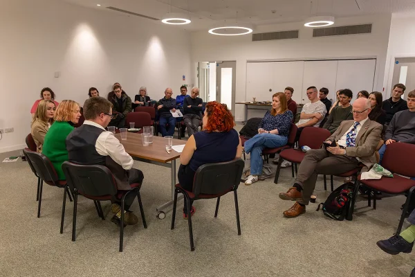 A panel speaking in front of an audience at the NUJ Leeds and West Yorkshire AGM.