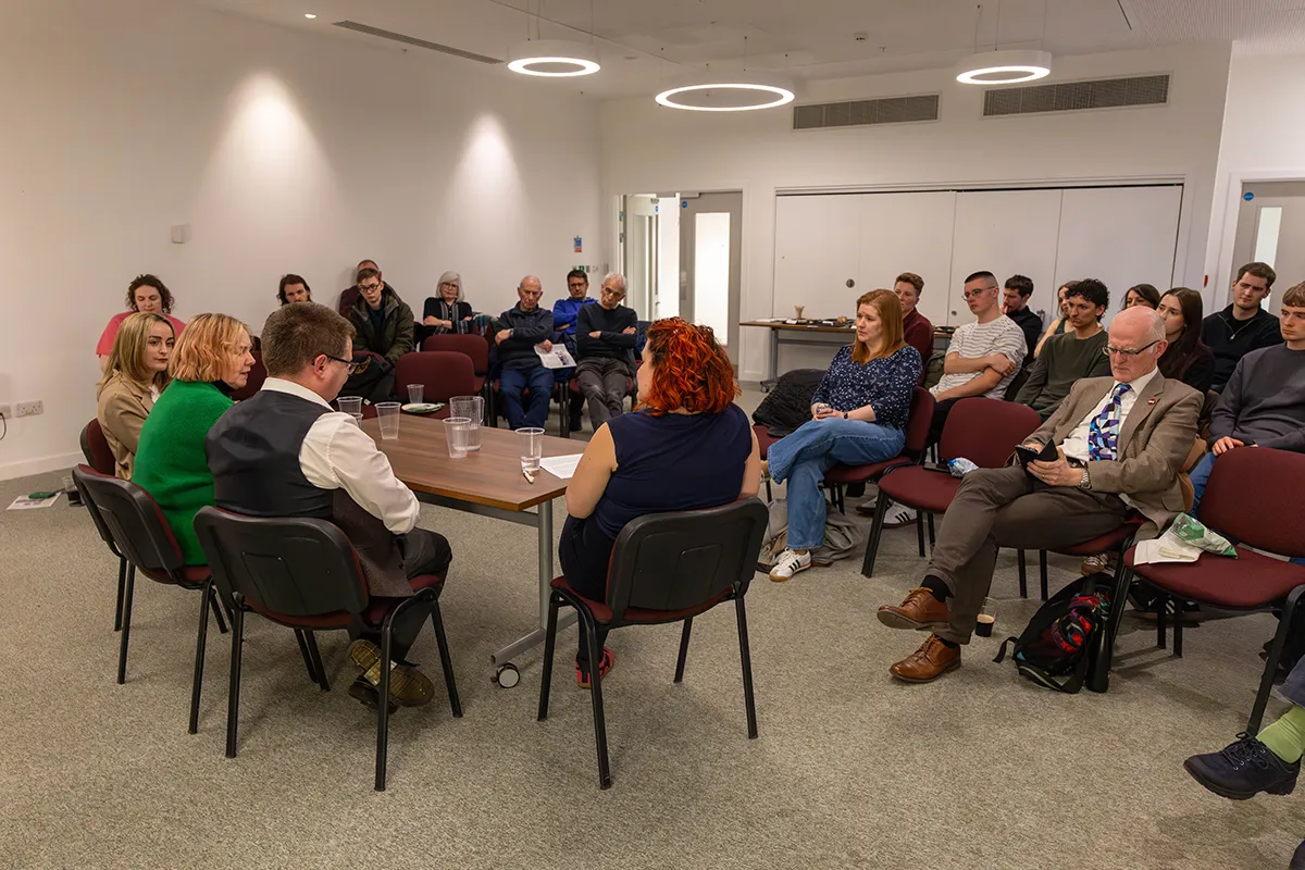 A panel speaking in front of an audience at the NUJ Leeds and West Yorkshire AGM.